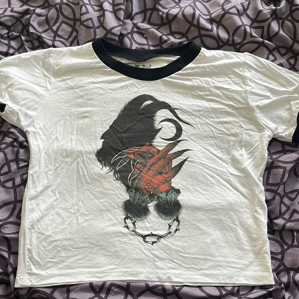 Vera’s eye candy ringer Satan tee